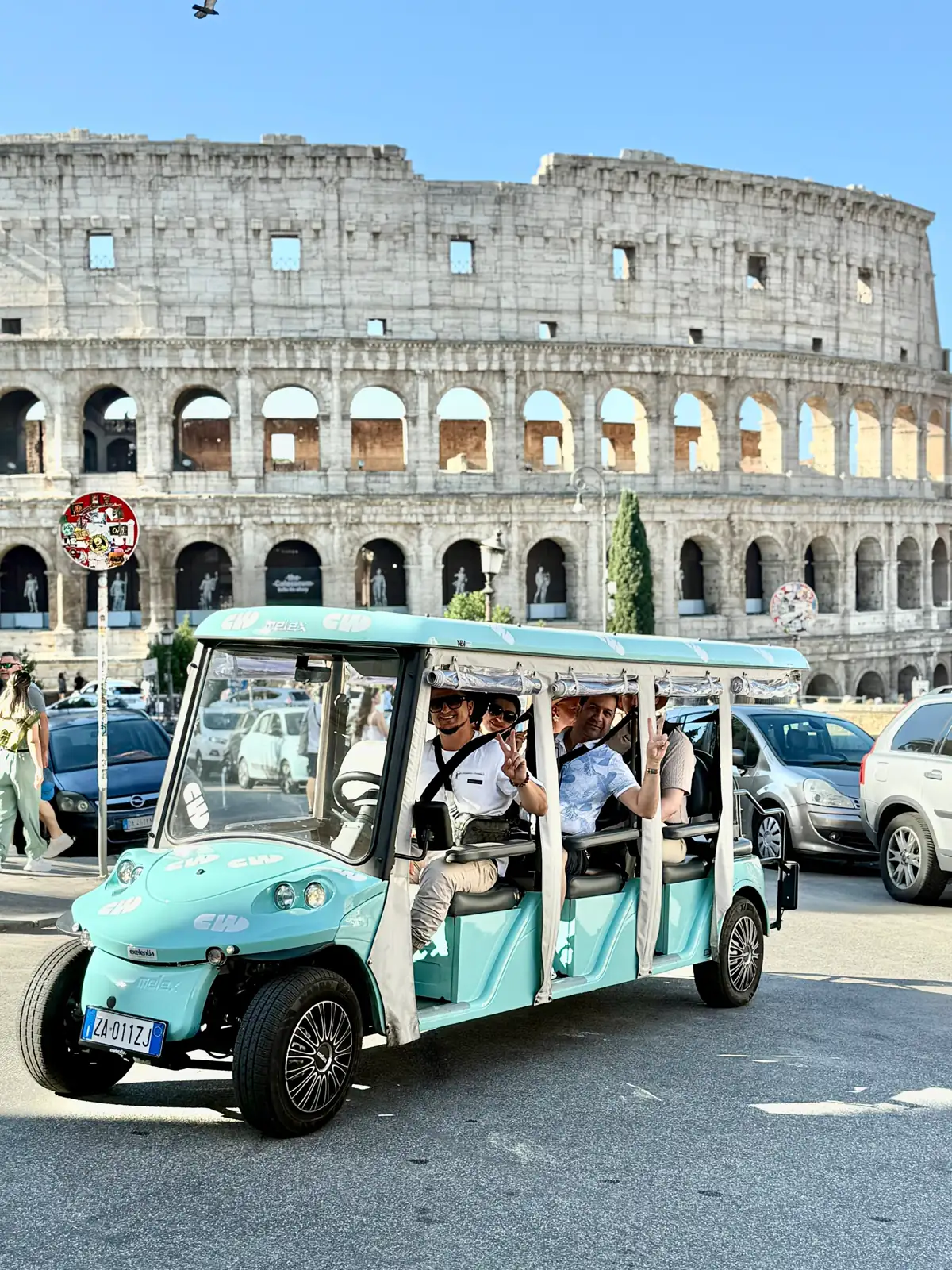 Golf cart tour group at the Colosseum, Rome